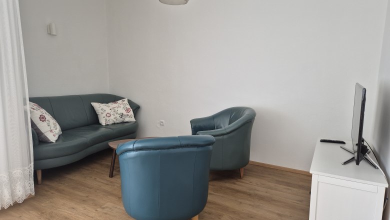 Wohnzimmer Ferienhaus am Schlosspark, © Kainz-Waldinger